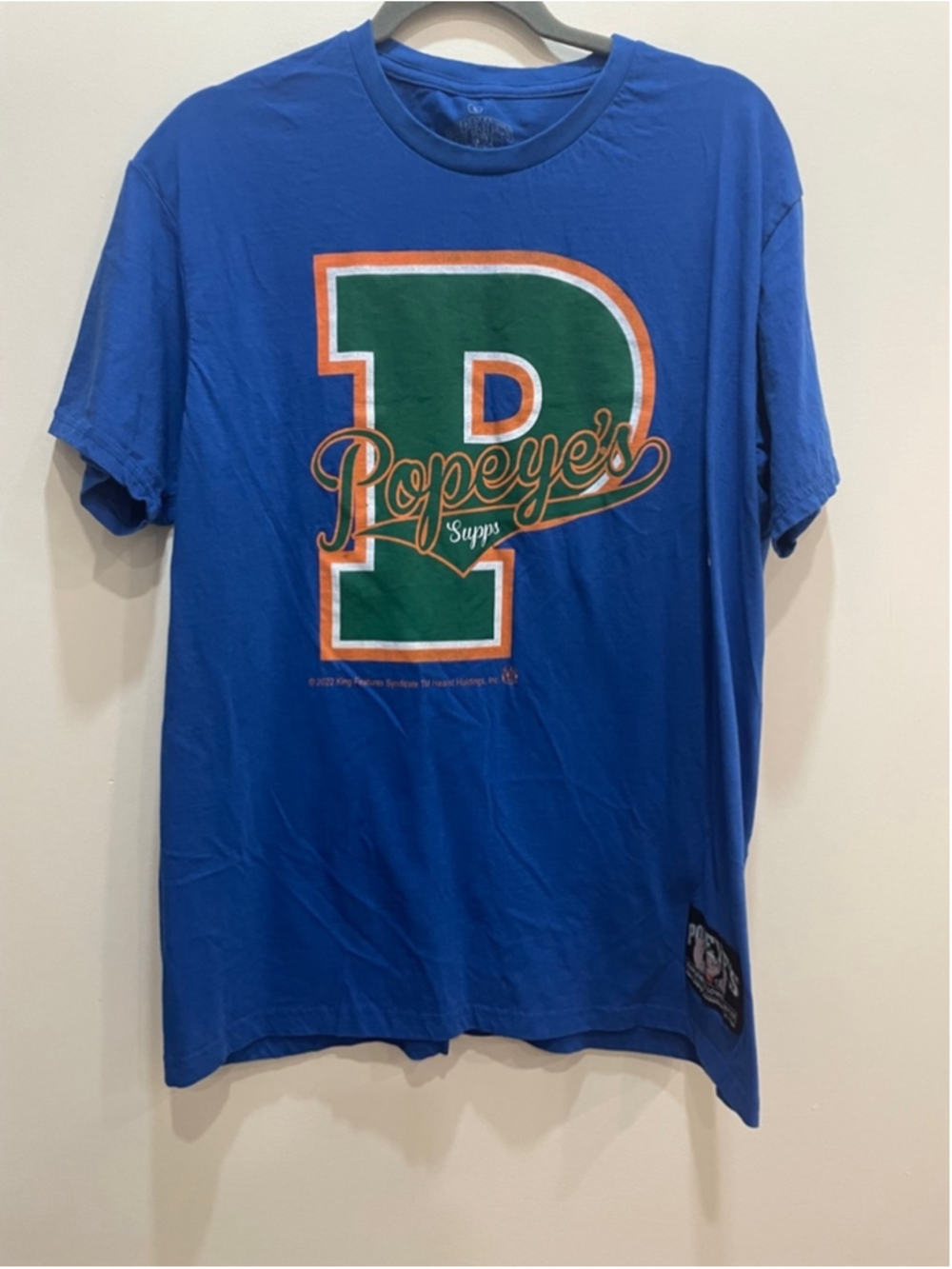 Popeye's Supplements Graphic T-Shirt L Blue Varsity Logo Strong to the Finish